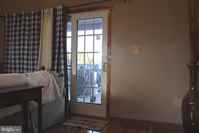 doorway to outside featuring hardwood / wood-style floors