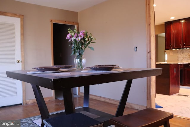 dining room featuring light wood-type flooring