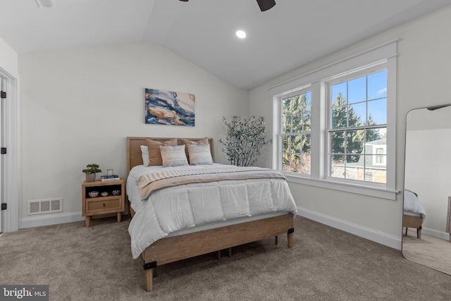 bedroom featuring vaulted ceiling, carpet floors, and ceiling fan