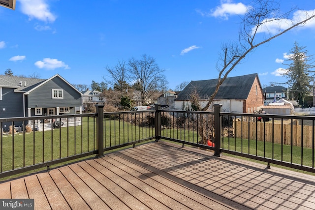 wooden terrace with a yard