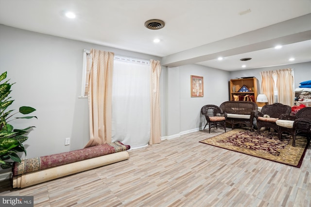 sitting room with light hardwood / wood-style flooring