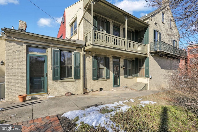 rear view of house with a patio area