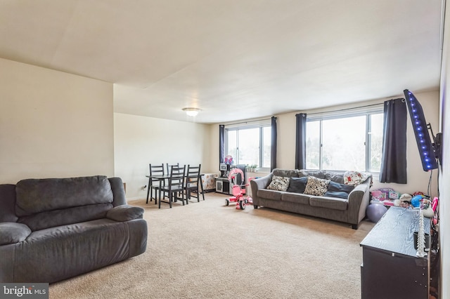 living room featuring light colored carpet