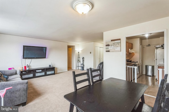 dining room with carpet floors