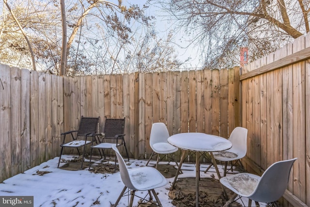 view of snow covered patio