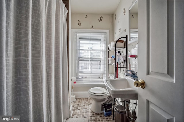 bathroom with sink and toilet