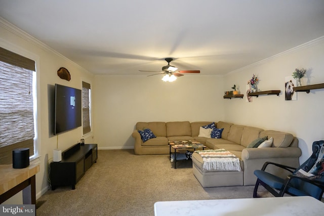 living room featuring ornamental molding, light colored carpet, and ceiling fan