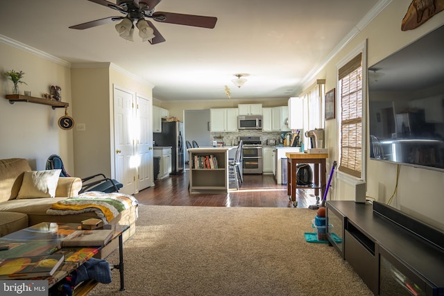 living room featuring crown molding, dark hardwood / wood-style floors, and ceiling fan