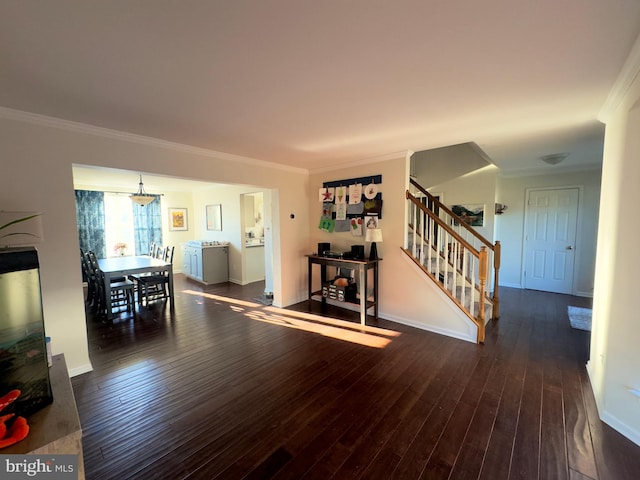 living room featuring crown molding and dark hardwood / wood-style floors