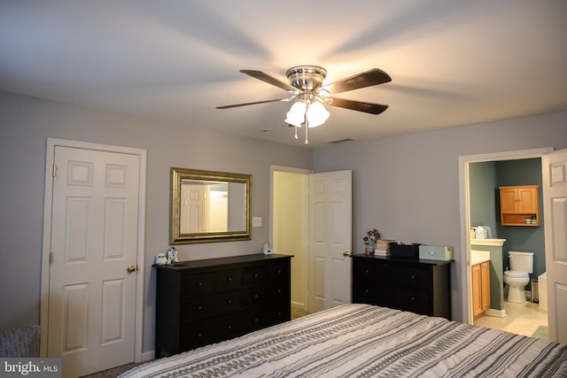 bedroom featuring connected bathroom and ceiling fan