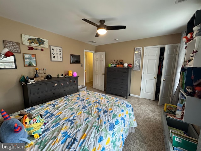 bedroom with light carpet and ceiling fan