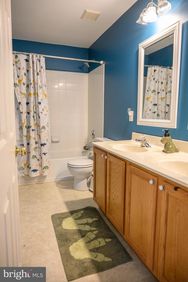 full bathroom featuring vanity, toilet, and shower / bath combo