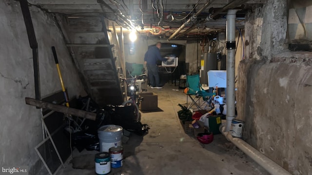 basement featuring water heater