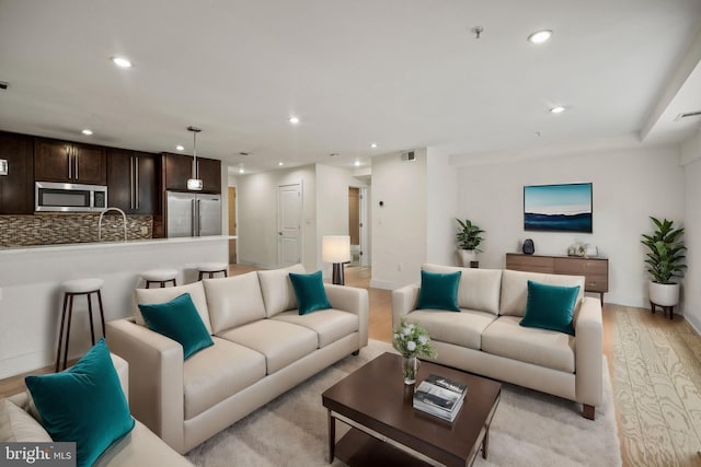 living room featuring light hardwood / wood-style floors