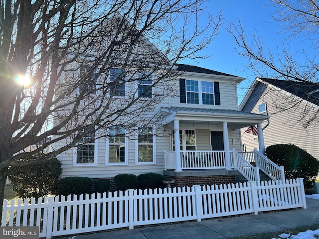 view of front of property featuring covered porch