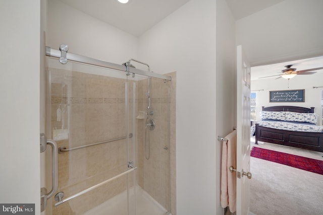 bathroom with ceiling fan and walk in shower