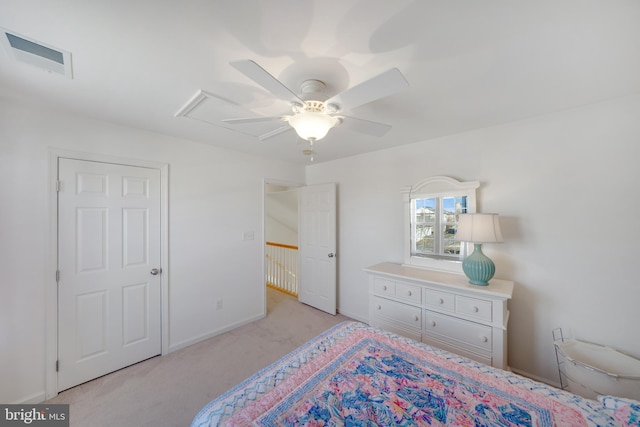 carpeted bedroom with ceiling fan