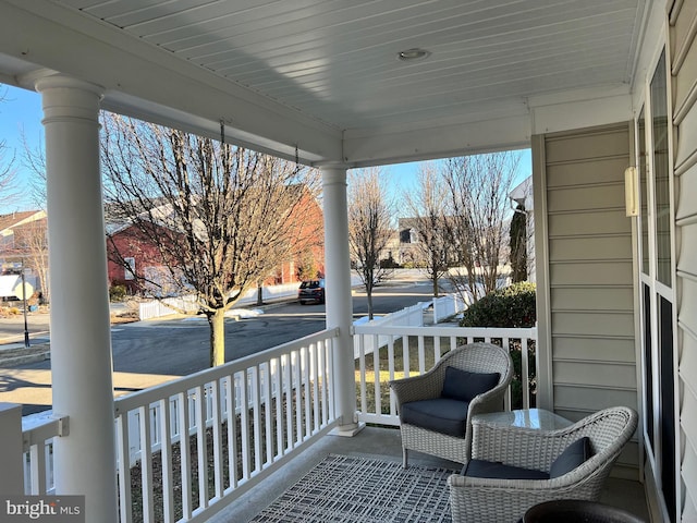 balcony featuring a porch