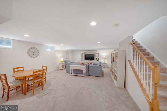 view of carpeted dining space