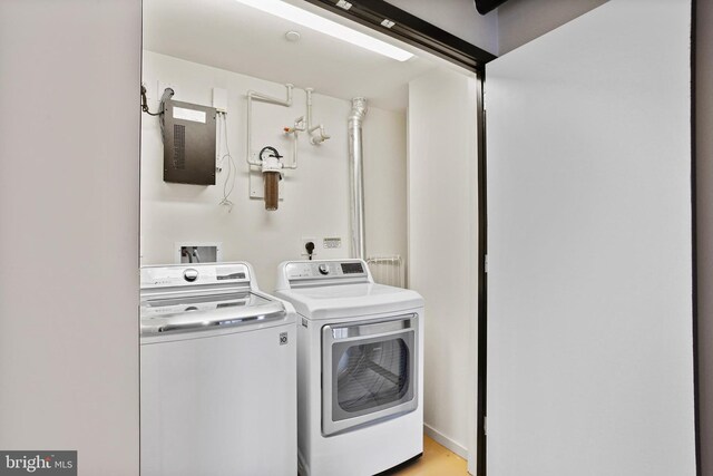 laundry area with washer and dryer