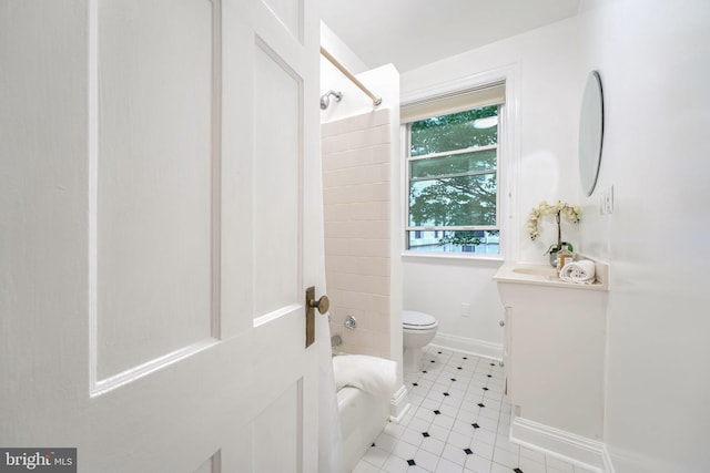 full bathroom with vanity, tub / shower combination, and toilet