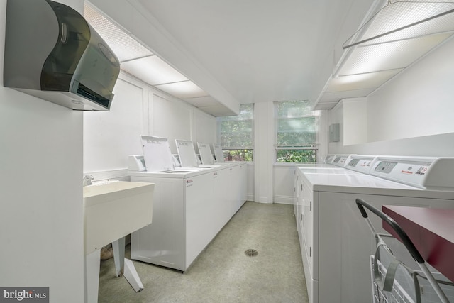 laundry room featuring separate washer and dryer