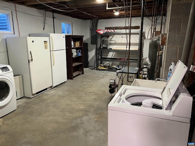 laundry room featuring independent washer and dryer