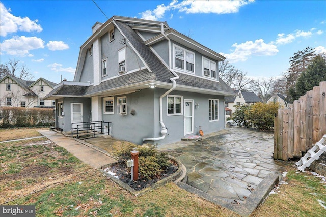 view of front of property featuring a patio area