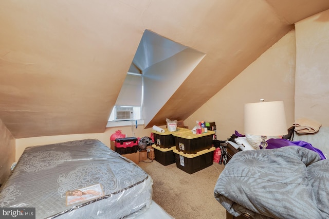 bedroom featuring cooling unit, carpet floors, and lofted ceiling