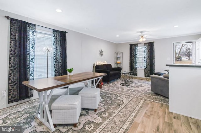 dining room featuring ceiling fan and light hardwood / wood-style floors