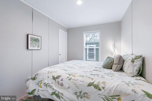 bedroom featuring ornamental molding