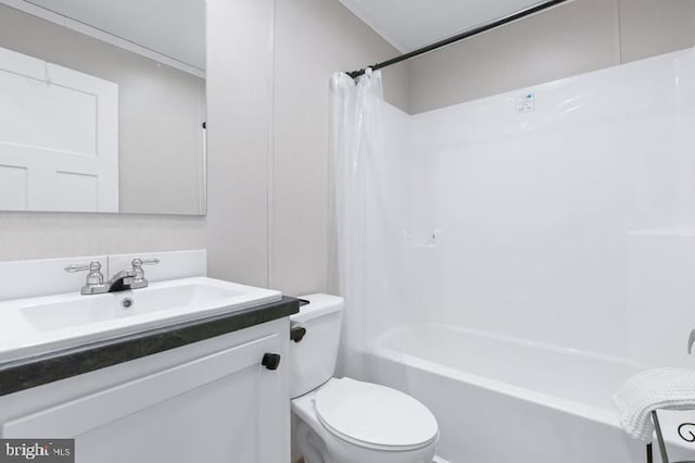 full bathroom with shower / bath combination with curtain, vanity, and toilet