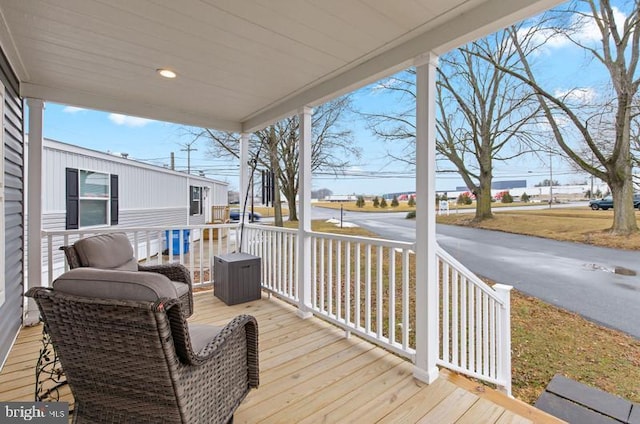 wooden deck featuring a porch