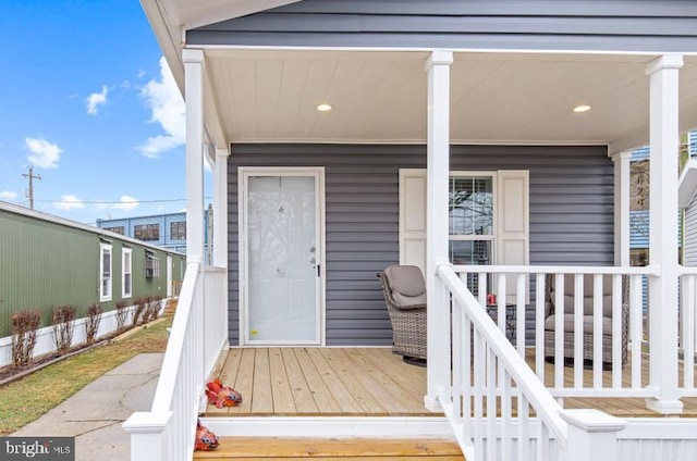 entrance to property with a porch