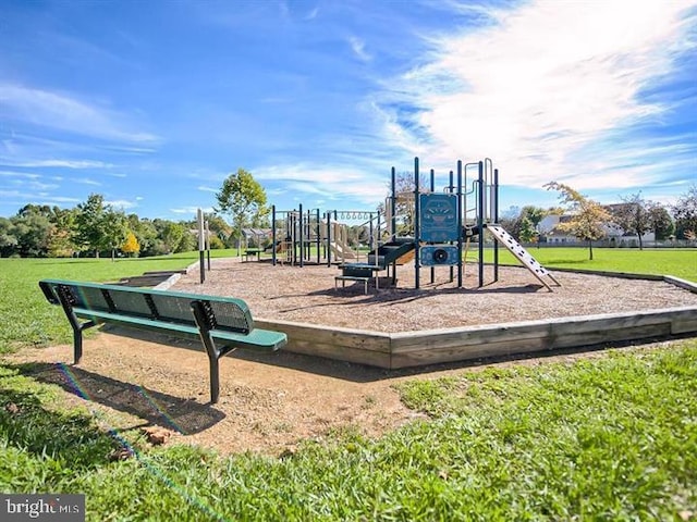 communal playground with a lawn