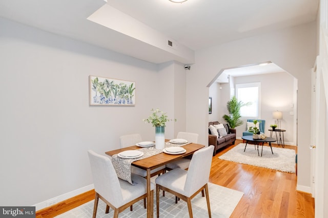 dining room featuring light hardwood / wood-style flooring