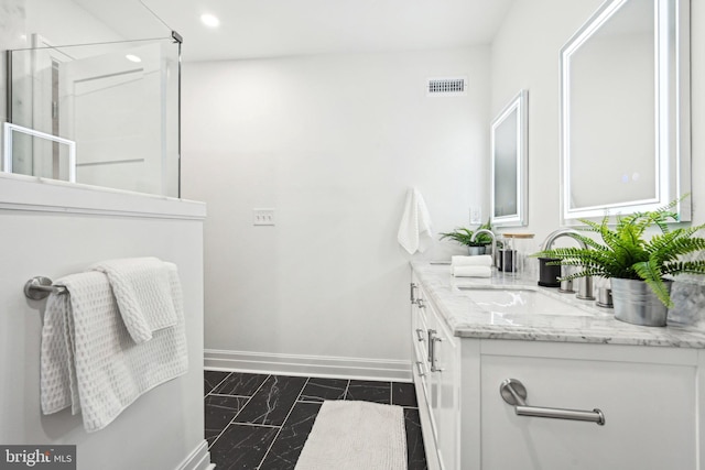 bathroom featuring vanity