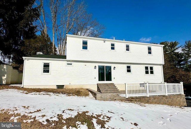 view of snow covered property