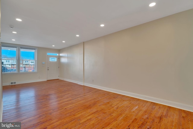 empty room with light wood-type flooring