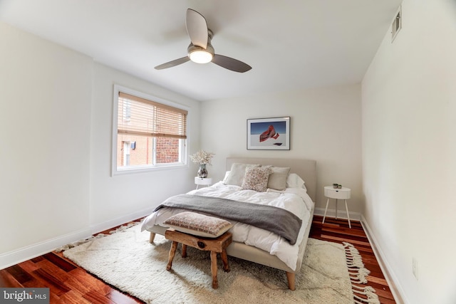 bedroom featuring ceiling fan and hardwood / wood-style floors