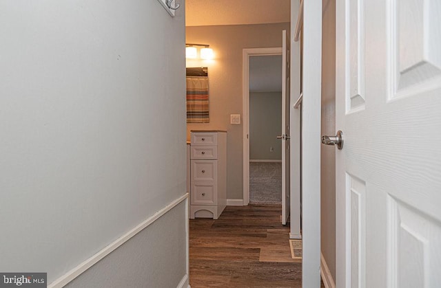 hallway featuring dark hardwood / wood-style floors