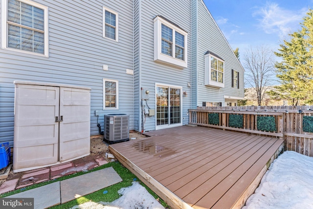 wooden deck with central AC unit