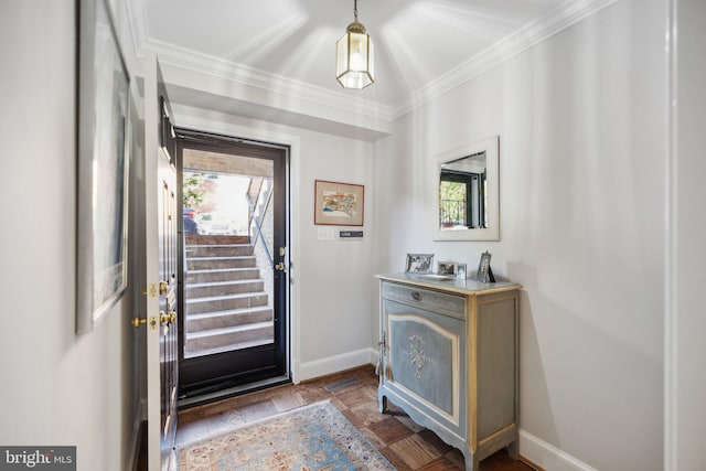 foyer featuring ornamental molding