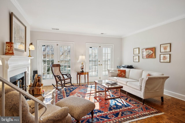 living room featuring parquet floors, ornamental molding, and french doors