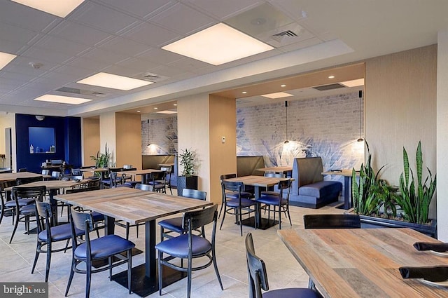 dining space with light tile patterned floors