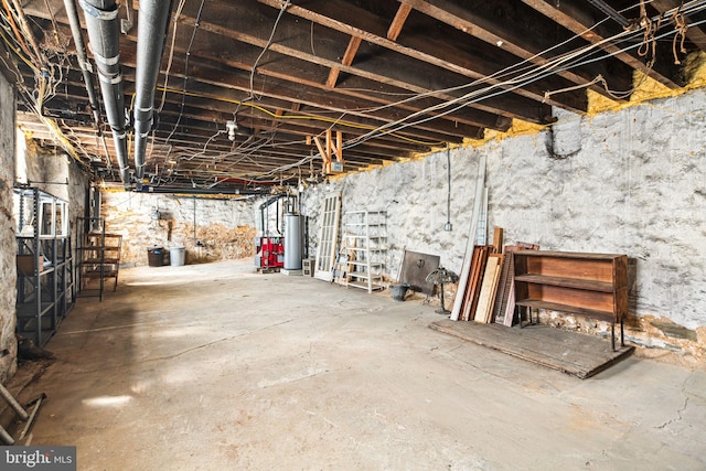 unfinished basement with gas water heater