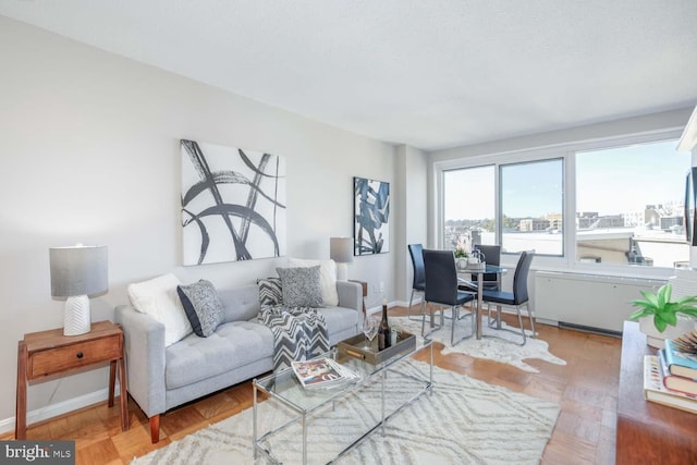 living room with parquet floors