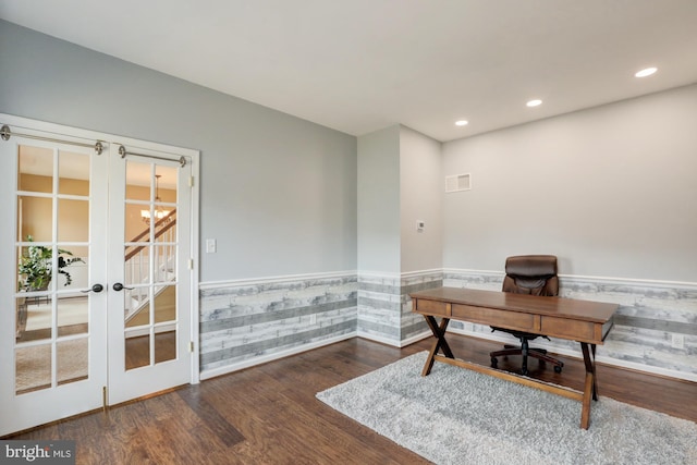 office featuring recessed lighting, dark wood finished floors, french doors, and wainscoting