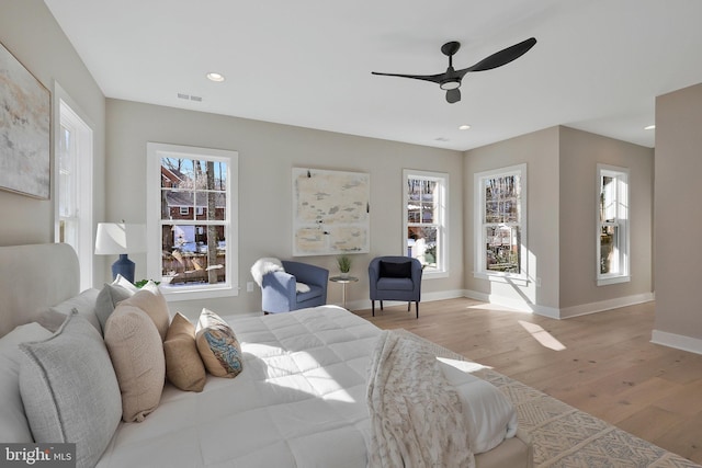 bedroom featuring ceiling fan and light wood-type flooring