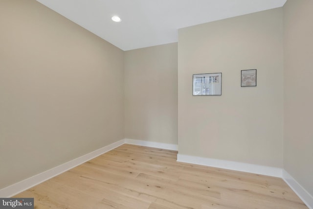 spare room featuring light hardwood / wood-style floors